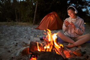 cheerful-young-woman-using-cellphone-while-sitting-2022-02-01-22-36-03-utc 2022 10 06a