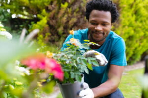 smiling-young-african-american-man-holding-potted-2022-01-31-18-18-41-utc – Copy (2) – Copy